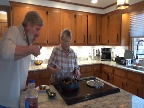 Don and Diane cooking duck n mussels Thumbnail